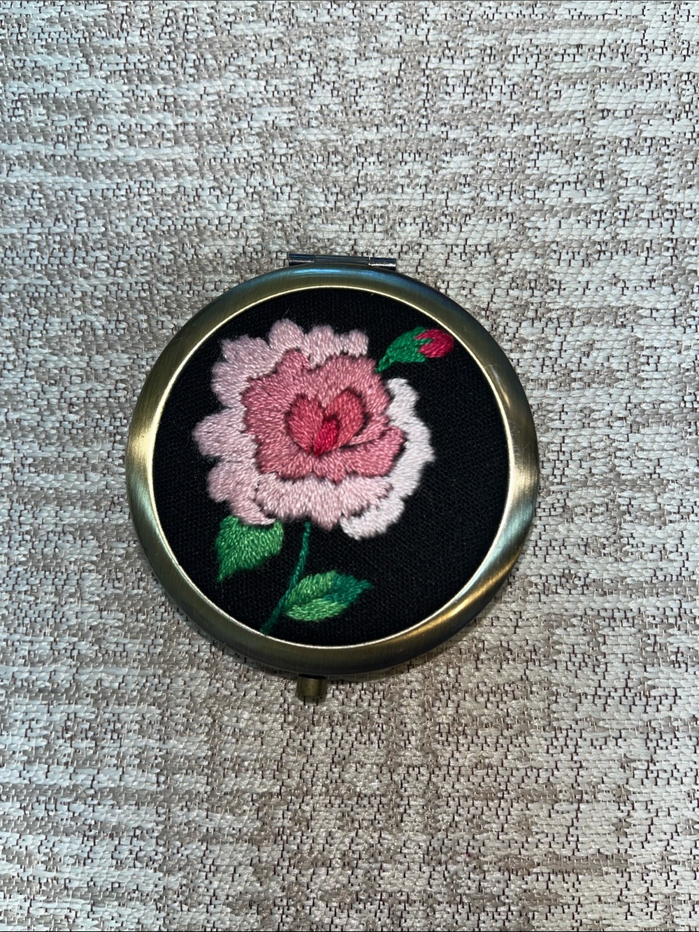 Embroidered rose pill container with mirror